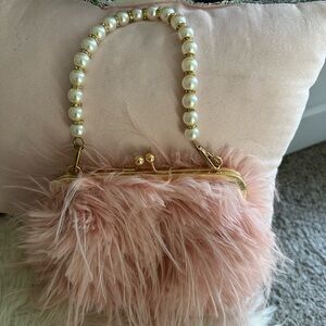 Luxurious Pink Fur Clutch with Pearl Handle